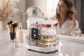 Makeup brush cleaning and drying device